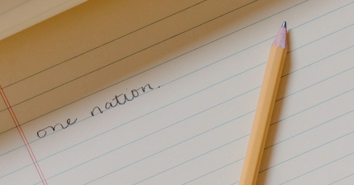 Notebook page with handwritten lines and a margin with brief notes